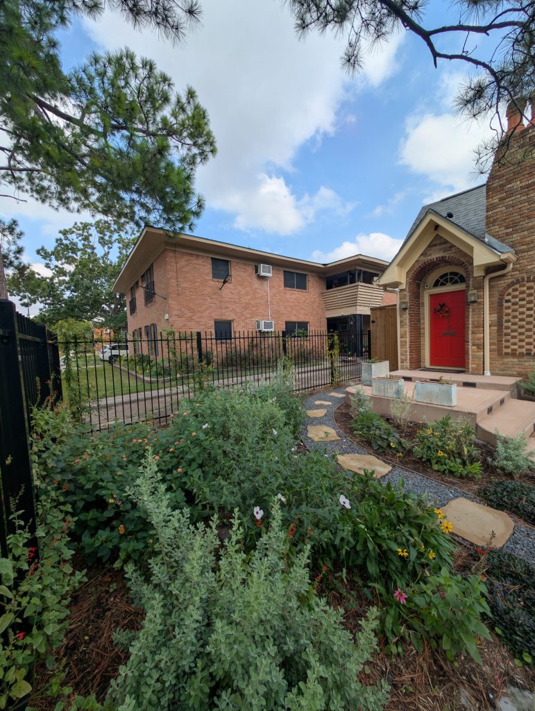 concrete and stone walkway at a home in Houston from the side angle