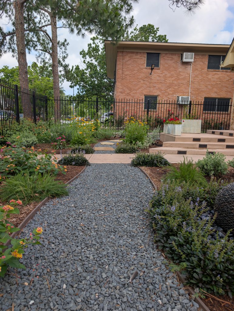 new sidewalk and stone walkway at a Houston home